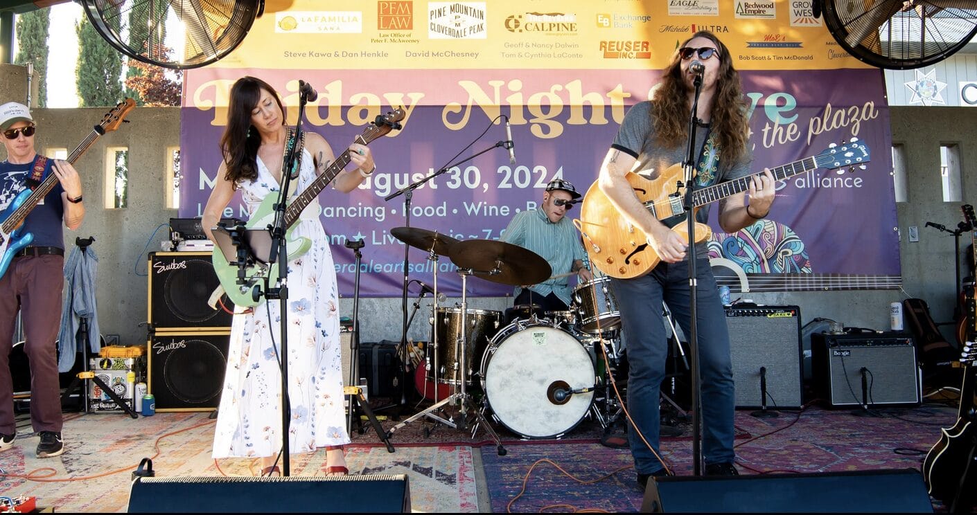 A band performs on the stage in Cloverdale's Plaza in the heart of the city